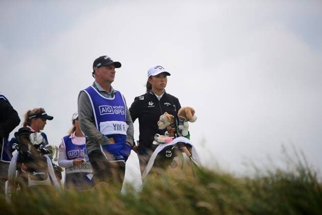 31st July 2025; Royal Porthcawl Golf Club, Porthcawl, Wales; AIG Womens Open Golf, Round 1; Ruoning Yin and her caddy checking yardage at the 3rd hole  AledxHopkins