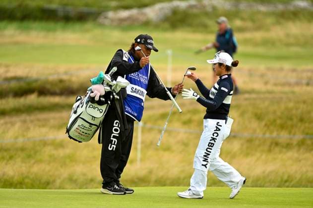 31st July 2025; Royal Porthcawl Golf Club, Porthcawl, Wales; AIG Womens Open Golf, Round 1; Shuri Sakuma collects her putter for her next shot  AledxHopkins