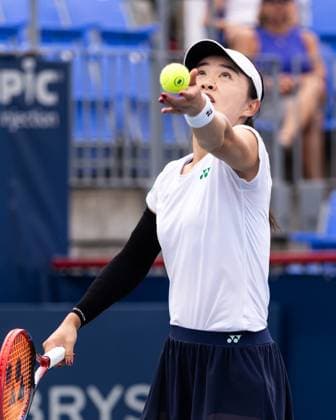 July 31, 2025, Montreal, Quebec, Canada: LIN ZHU from China serving in first set against Susan Lamens from Netherland in round of 32 at Canadian Open at IGA stadium in Montreal, Quebec, Canada on 2025-07-31 Montreal Canada - ZUMAl189 20250731_zsp_l189_033 Copyright: xYannickxLegarex