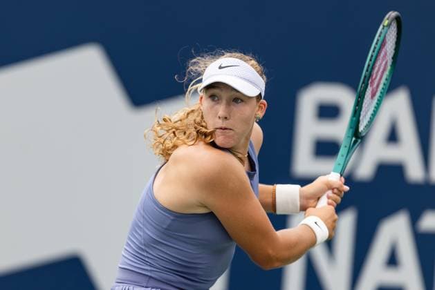 July 31, 2025, Montreal, Quebec, Canada: MIRA ANDREEVA (4) back hand in first set against McCartney Kessler (28) from USA in round of 32 at Canadian Open at IGA stadium in Montreal, Quebec, Canada on 2025-07-31 Montreal Canada - ZUMAl189 20250731_zsp_l189_040 Copyright: xYannickxLegarex