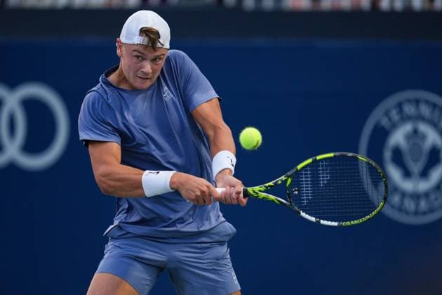 ATP, Tennis Herren Masters 1000 National Bank Open Toronto Presented by Rogers 2025 - Day 6 Holger Rune of Denmark plays a backhand against Alexandre Muller of France during the Men s Singles third round match on day 6 of the ATP Masters 1000 National Bank Open at Sobeys Stadium. on July 31, 2025 in Toronto, Canada. (Photo by Leonardo Ramirez Eyepix Group) Copyright: xLeonardoxRamirezx xEyepixxGroupx LR-31072025-07535