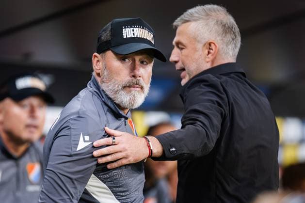 July 31, 2025, Warsaw, Poland: Pavel Hapal (L) coach of Banik and Edward Iordanescu (R) coach of Legia are seen during the 2nd round qualifying UEFA Europa League match between Legia Warszawa and FC Banik Ostrava at Marshal Jozef Pilsudski Legia Warsaw Municipal Stadium. Final score; Legia Warszawa 2:1 FC Banik Ostrava. Warsaw Poland - ZUMAs197 20250731_aaa_s197_200 Copyright: xMikolajxBarbanellx