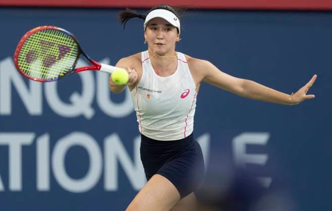 August 1, 2025, Montreal, Pq, Canada: Eva Lys of Germany hits a return to Iga Swiatek of Poland during third round tennis action at the National Bank Open in Montreal, Friday, Aug. 1, 2025. Canada News - August 1, 2025  - ZUMAc35_ 20250801_zaf_c35_126 Copyright: xChristinnexMuschix
