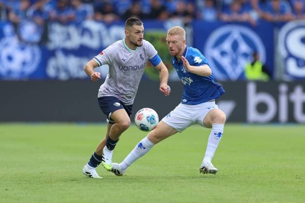 02.08.2025, xdcx, Fussball 2. Bundesliga, SV Darmstadt 98 - VfL Bochum, emonline, emspor, despor, v.l., Matus Bero (VfL Bochum), Kai Klefisch (SV Darmstadt 98) DFL DFB REGULATIONS PROHIBIT ANY USE OF PHOTOGRAPHS AS IMAGE SEQUENCES AND OR QUASI-VIDEO.