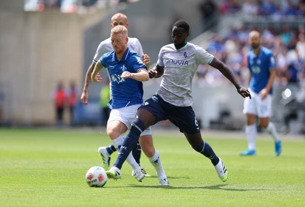 02.08.2025, xdcx, Fussball 2. Bundesliga, SV Darmstadt 98 - VfL Bochum, emonline, emspor, despor, v.l., Kai Klefisch (SV Darmstadt 98), Ibrahima Sissoko (VfL Bochum) DFL DFB REGULATIONS PROHIBIT ANY USE OF PHOTOGRAPHS AS IMAGE SEQUENCES AND OR QUASI-VIDEO.