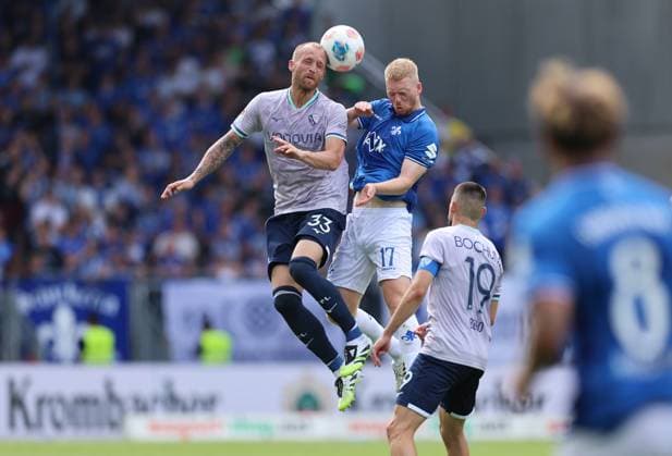 02.08.2025, xdcx, Fussball 2. Bundesliga, SV Darmstadt 98 - VfL Bochum, emonline, emspor, despor, v.l., Philipp Hofmann (VfL Bochum), Kai Klefisch (SV Darmstadt 98) DFL DFB REGULATIONS PROHIBIT ANY USE OF PHOTOGRAPHS AS IMAGE SEQUENCES AND OR QUASI-VIDEO.