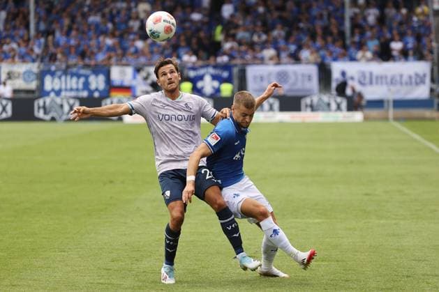 02.08.2025, xtvx, Fussball 2.Bundesliga, SV Darmstadt 98 - VfL Bochum v.l. Zweikampf, Duell, duel, tackle, compete Romario Roesch (VfL Bochum) Fabian Nuernberger (SV Darmstadt 98) (DFL DFB REGULATIONS PROHIBIT ANY USE OF PHOTOGRAPHS as IMAGE SEQUENCES and or QUASI-VIDEO) Darmstadt