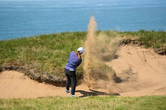 2nd August 2025; Royal Porthcawl Golf Club, Porthcawl, Wales; AIG Womens Open Golf, Round 3; Ayaka Furue hitting out of the bunker on the 1st hole  AledxHopkins