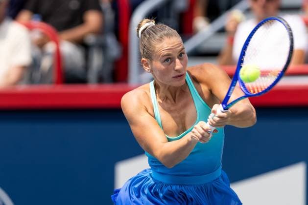 August 2, 2025, Montreal, Quebec, Canada: MARTA KOSTYUK (24) from Ukraine backhand in first set against McCartney Kessler (28) from USA in round of 16 at Canadian Open at IGA stadium in Montreal, Quebec, Canada on 2025-08-02 Montreal Canada - ZUMAl189 20250802_zsp_l189_026 Copyright: xYannickxLegarex