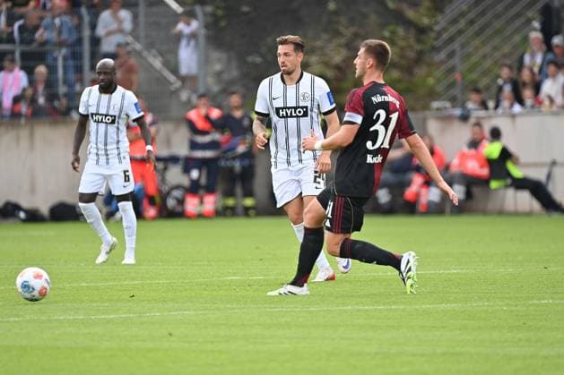 02.08.2025, xjrdrx, Fussball 2.Bundesliga, SV Elversberg - 1.FC Nürnberg v.l. Luca Schnellbacher (SV Elversberg) Robin Knoche (1.FC Nuernberg) Zweikampf, Aktion, action, battle for the ball (DFL DFB REGULATIONS PROHIBIT ANY USE OF PHOTOGRAPHS as IMAGE SEQUENCES and or QUASI-VIDEO) Elversberg