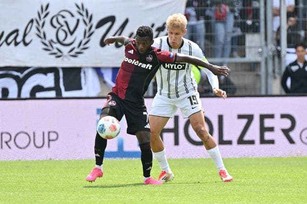 02.08.2025, xjrdrx, Fussball 2.Bundesliga, SV Elversberg - 1.FC Nürnberg v.l. Mickael Biron (1.FC Nuernberg) Lukas Pinckert (SV Elversberg) Zweikampf, Aktion, action, battle for the ball (DFL DFB REGULATIONS PROHIBIT ANY USE OF PHOTOGRAPHS as IMAGE SEQUENCES and or QUASI-VIDEO) Elversberg
