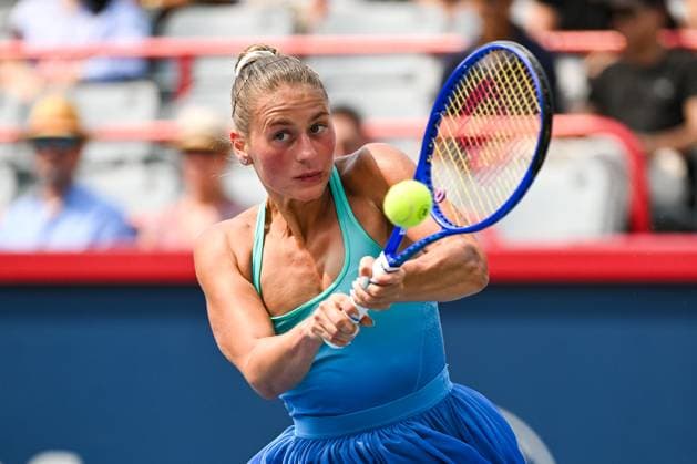 MONTREAL, QC - AUGUST 02: Marta Kostyuk (UKR) returns the ball during a fourth round match at WTA, Tennis Damen National Bank Open on August 02, 2025 at IGA Stadium in Montreal, QC (Photo by David Kirouac Icon Sportswire) TENNIS: AUG 02 National Bank Open EDITORIAL USE ONLY Icon250802027