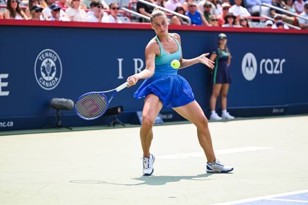 MONTREAL, QC - AUGUST 02: Marta Kostyuk (UKR) returns the ball during a fourth round match at WTA, Tennis Damen National Bank Open on August 02, 2025 at IGA Stadium in Montreal, QC (Photo by David Kirouac Icon Sportswire) TENNIS: AUG 02 National Bank Open EDITORIAL USE ONLY Icon250802013