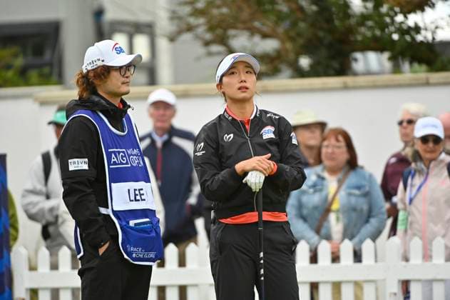 1st August 2025; Royal Porthcawl Golf Club, Porthcawl, Wales; AIG Womens Open Golf, Round 2; Dongeun Lee on the first tee with her caddie  AledxHopkins