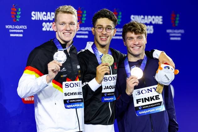 Ahmed Jaouadi of Tunesia, Sven Schwarz of Germany, Bobby Finke of USA Medal Ceremony Men 1.500m Freestyle, Swimming, Singapore 2025 World Aquatics Championships, WCH Arena, August 3, 2025, Singapore, Singapore.