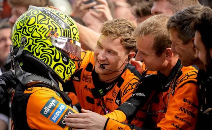 BOEDAPEST - Lando Norris (McLaren) receives congratulations after winning at the Hungaroring during the Hungarian Grand Prix. ANP SANDER KING xVIxANPxSportx xxANPxIVx 532755877 originalFilename: 532755877.jpg