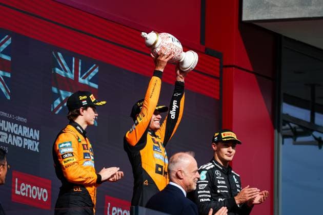 F1 - HUNGARIAN GRAND PRIX 2025 Podium: NORRIS Lando (gbr), McLaren F1 Team MCL39, PIASTRI Oscar (aus), McLaren F1 Team MCL39, RUSSELL George (gbr), Mercedes AMG F1 Team W16, portrait, during the 2025 Formula 1 Lenovo Hungarian Grand Prix, 14th round of the 2025 FIA Formula One World Championship, WM, Weltmeisterschaft from August 1 to 3, 2025 on the Hungaroring, in Mogyorod, Hungary - MogyorodHungary Copyright: xFLORENTxGOODENx