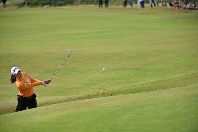 3rd August 2025; Royal Porthcawl Golf Club, Porthcawl, Wales; AIG Womens Open Golf, Final Round; Rio Takeda chips out of a bunker on the 13th hole  AledxHopkins