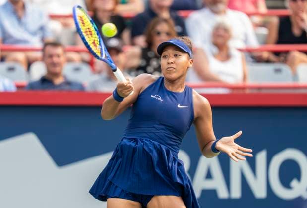 August 3, 2025, Montreal, Pq, Canada: Naomi Osaka of Japan hits a return to Anastasija Sevastova of Latvia during round of 16 tennis action at the National Bank Open in Montreal, Sunday, Aug. 3, 2025. Canada News - August 3, 2025  - ZUMAc35_ 20250803_zaf_c35_071 Copyright: xChristinnexMuschix