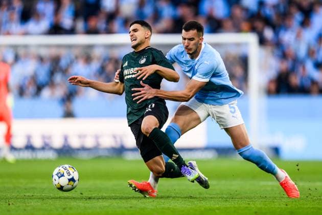 250805 Mohamed Elyounoussi of FC Copenhagen and Andrej Djuric of Malmö FF during the UEFA Champions League qualifier football match between Malmö FF and FC Copenhagen on August 5, 2025 in Malmö. Photo: Carl Sandin BILDBYRAN kod CS CS0745 fotboll football soccer fotball uefa champions league champions league malmö ff fc copenhagen bbeng bbauto Copyright: CARLxSANDIN BB250805CS076