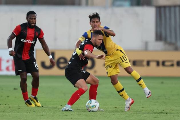 Jovan Cadjenovic (left) of Hamrun Spartans vies for the ball with Weslley Patati of Maccabi Tel Aviv during the the UEFA Europa League Third qualifying round, 1st leg soccer match between Hamrun Spartans FC and Maccabi Tel Aviv FC at the Tony Bezzina Stadium, in Paola, Malta, on 05 August 2025. UEFA Europa League - Hamrun Spartans FC v Maccabi Tel Aviv FC