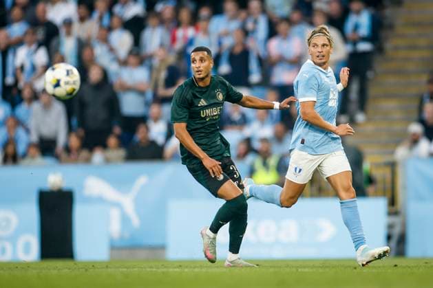 CORRECTION NAME OF MALMO PLAYER MALMÖ, SWEDEN 20250805 Copenhagen s Elias Achouri (left) and Malmö s Jens Stryger Larsen in action during the third qualifying round, 1st leg Champions League soccer match between Malmo FF and FC Copenhagen at Malmo New Stadium in Malmo, Sweden, on Aug. 5, 2025. MALMÖ SWEDEN ttexport x10600x