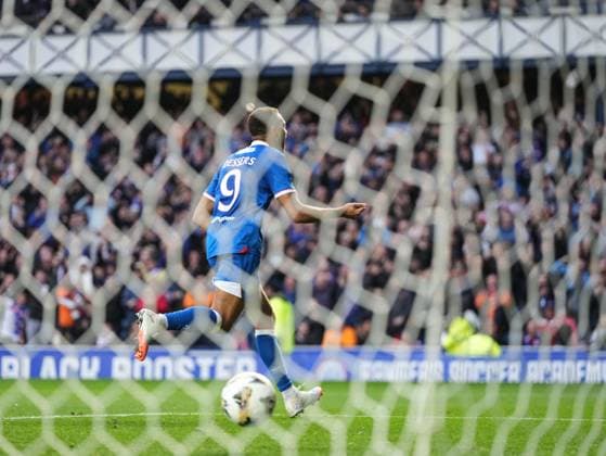 Cyriel Dessers of Rangers celebrates scoring from the penalty spot to give Rangers a 2-0 lead. Rangers v Viktoria Plzen, UEFA Champions League, 3rd Qualifying Round, First Leg, Football, Ibrox Stadium, Glasgow, Scotland, UK - 05 Aug 2025Glasgow Ibrox Stadium Scotland United Kingdom EDITORIAL USE ONLY No use with unauthorised audio, video, data, fixture lists, club league logos or live services. Online in-match use limited to 120 images, no video emulation. No use in betting, games or single club league player publications.  Copyright: xStuartxWallace Shutterstockx 15428174ac