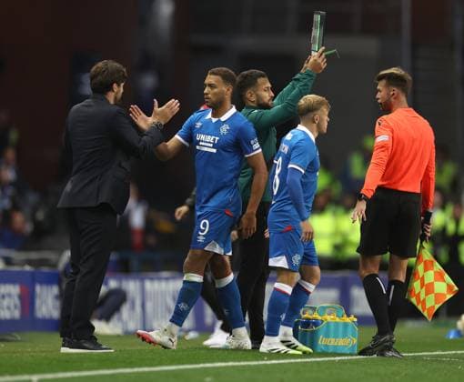 Rangers head coach Russell Martin replaces Cyriel Dessers during the Champions League third qualifying round first leg match at Ibrox Stadium, Glasgow. Rangers v Viktoria Plzen - UEFA Champions League - Third Qualifying Round First Leg - Ibrox Stadium, Glasgow, Lanarkshire, Scotland, UK - 05 Aug 2025Glasgow Ibrox Lanarkshire United Kingdom  Copyright: xO Rourke RangersxFC Shutterstockx 15428761cr