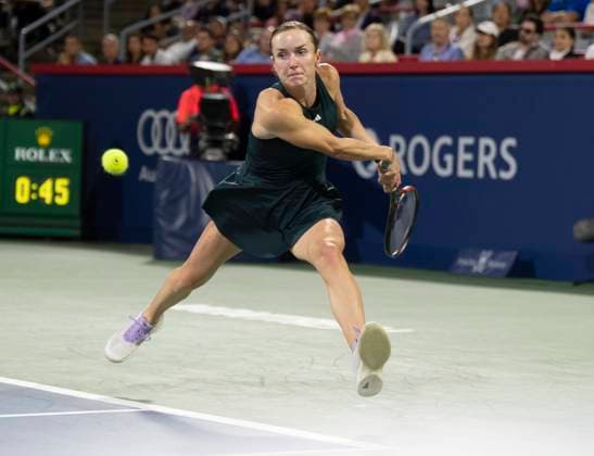 August 5, 2025, Montreal, Pq, Canada: Elina Svitolina of Ukraine hits a return to Naomi Osaka of Japan during quarterfinal tennis action at the National Bank Open in Montreal, Tuesday, Aug. 5, 2025. Canada News - August 5, 2025  - ZUMAc35_ 20250805_zaf_c35_085 Copyright: xChristinnexMuschix