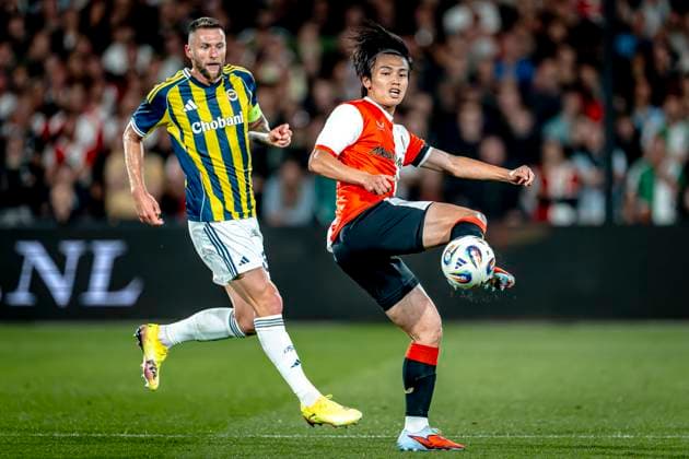 Fenerbahce SK defender Mila Skriniar, Feyenoord Rotterdam forwarder Ayase Ueda during the match Feyenoord - Fenerbahce at the Kuip Stadium for the third qualifying round champions league season 2025-2026 in Rotterdam, Netherlands on 6 august 2025, (photo by Marcel van Dorst EYE4images DeFodi Images)