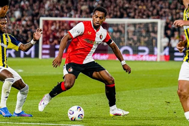 2025-08-06 Feyenoord v Fenerbahce SK - UEFA Champions League Third Qualifying Round ROTTERDAM, NETHERLANDS - AUGUST 6: Quinten Timber of Feyenoord dribbles during the UEFA Champions League Third Qualifying Round match between Feyenoord and Fenerbahce SK at Stadion Feijenoord on August 6, 2025 in Rotterdam, Netherlands. Rotterdam Stadion Feijenoord Netherlands Content not available for redistribution in The Netherlands directly or indirectly through any third parties. Copyright: xJorisxVerwijstx