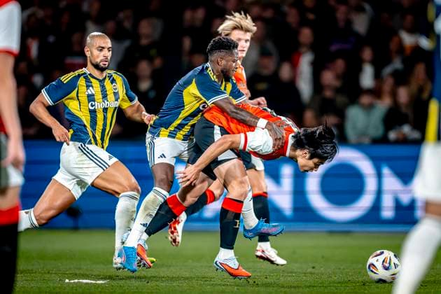 Fenerbahce SK midfielder Fred, Feyenoord Rotterdam forwarder Ayase Ueda during the match Feyenoord - Fenerbahce at the Kuip Stadium for the third qualifying round champions league season 2025-2026 in Rotterdam, Netherlands on 6 august 2025, (photo by Marcel van Dorst EYE4images DeFodi Images)