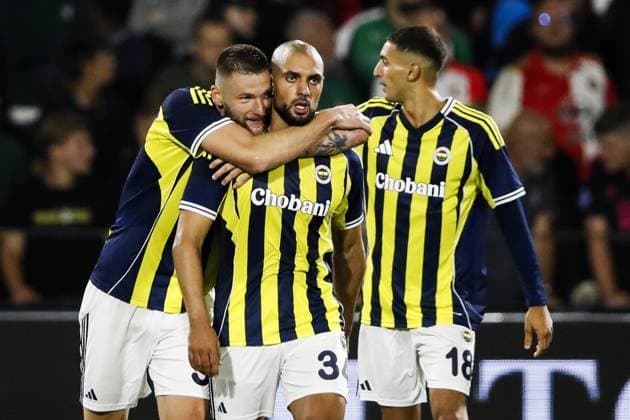 ROTTERDAM - Sofyan Amrabat of Fenerbahce SK (c) receives congratulations after scoring 1-1 during the third qualifying round Champions League match between Feyenoord and FenerbahoÂße at Feyenoord Stadium de Kuip on Aug. 6, 2025 in Rotterdam, Netherlands. ANP BART STOUTJESDIJK UEFA Champions League Third Qualifying Round First Leg 2025-2026 xVIxANPxSportx xxANPxIVx 532932767 originalFilename: 532932767.jpg