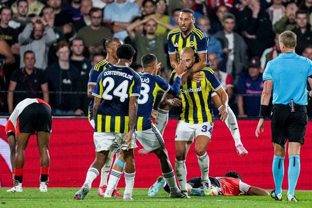 2025-08-06 Feyenoord v Fenerbahce SK - UEFA Champions League Third Qualifying Round ROTTERDAM, NETHERLANDS - AUGUST 6: Sofyan Amrabat of Fenerbahce SK celebrates the late equalizer with his team during the UEFA Champions League Third Qualifying Round match between Feyenoord and Fenerbahce SK at Stadion Feijenoord on August 6, 2025 in Rotterdam, Netherlands. Rotterdam Stadion Feijenoord Netherlands Content not available for redistribution in The Netherlands directly or indirectly through any third parties. Copyright: xJorisxVerwijstx