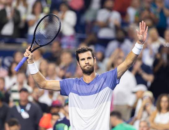 (250807) -- TORONTO, Aug. 7, 2025 -- Karen Khachanov of Russia celebrates victory after the men s singles semifinal match between Alexander Zverev of Germany and Karen Khachanov of Russia at the 2025 National Bank Open tennis tournament in Toronto, Canada, on Aug. 6, 2025. (Photo by Xinhua) (SP)CANADA-TORONTO-TENNIS-NATIONAL BANK OPEN-MEN S SINGLES-SEMIFINALS ZouxZheng 