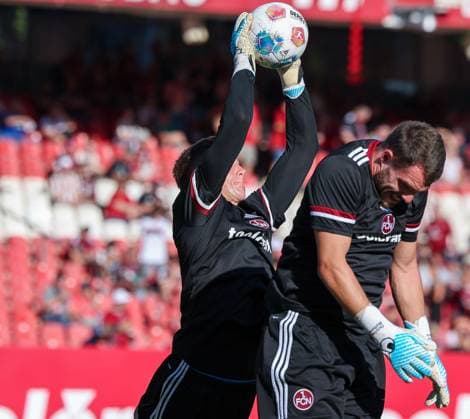 Jan Reichert 1 (1FC Nuernberg) und Christian Mathenia 26 (1FC Nuernberg), rechts, beim Warm up, 1. FC Nuernberg vs. SV Darmstadt 98, DFL, 2. Bundesliga, Saison 2025 2026, 2. Spieltag, Hinrunde, 08.08.2025 DFB regulations prohibit any use of photographs as image sequences and or quasi-video Nuernberg Bayern Deutschland