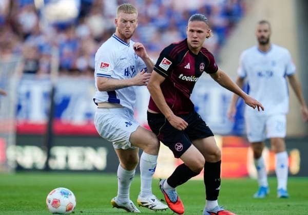 Kai Klefisch (SV Darmstadt 98, 17) und Artem Stepanov (1. FC Nuernberg, 11) GER, 1. FC Nuernberg vs SV Darmstadt 98, Fussball, 2. Bundesliga, 2. Spieltag, Saison 2025 2026, 08.08.2025 DFL REGULATIONS PROHIBIT ANY USE OF PHOTOGRAPHS AS IMAGE SEQUENCES AND OR QUASI-VIDEO GER, 1. FC Nuernberg vs SV Darmstadt 98, Fussball, 2. Bundesliga, 2. Spieltag, Saison 2025 2026, 08.08.2025 Nuernberg