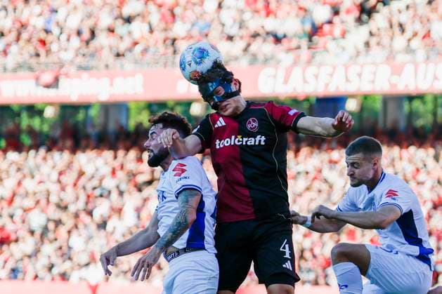 v.l. Marco Richter (SV Darmstadt, 23), Fabio Gruber (1.FC Nuernberg, 4) und Fabian Nuernberger (SV Darmstadt, 15), 08.08.2025, Fussball, 2. Bundesliga, 1. FC Nuernberg - SV Darmstadt 98, GER, Nuernberg, Max-Morlock-Stadion, DFL REGULATIONS PROHIBIT ANY USE OF PHOTOGRAPHS AS IMAGE SEQUENCES AND OR QUASI-VIDEO.