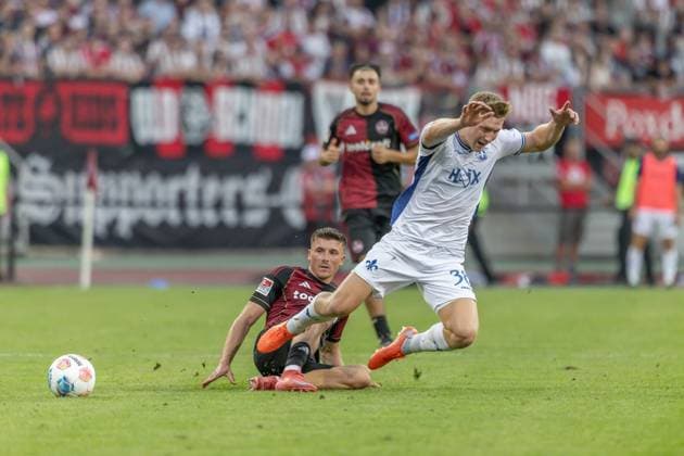 Nürnberg, Deutschland 08. August 2025: 2. Liga - 2025 2026 - 1. FC Nürnberg vs. SV Darmstadt 98 Im Bild: v. li. im Zweikampf Semir Telalovic (FCN) und Clemens Riedel (Darmstadt) DFL regulations prohibit any use of photographs as image sequences and or quasi-video