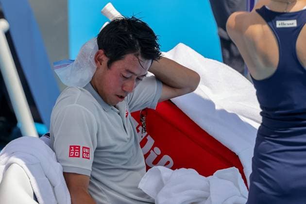 August 8, 2025, Mason, Ohio, U.S: Kei Nishikori (JPN) puts an ice bag on his neck to cool off during FridayÃ¢â‚¬â ¢s first round of the Cincinnati Open at the Lindner Family Tennis Center , Mason, Oh. Mason U.S - ZUMAs304 20250808_zaf_s304_124 Copyright: xScottxStuartx