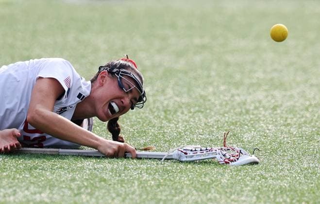 (250809) -- CHENGDU, Aug. 9, 2025 -- Marie McCool of the United States falls down during the women s preliminary round Group B match between the United States and the Czech Republic of Lacrosse event at The World Games 2025 in Chengdu, southwest China s Sichuan Province, Aug. 9, 2025. ) (SP)CHINA-CHENGDU-THE WORLD GAMES 2025-LACROSSE-WOMEN S-GROUP B (CN) ChenxBin 