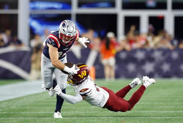 FOXBOROUGH, MA - AUGUST 08: New England Patriots running back Lan Larison (34) attempts to avoid a tackle during the NFL, American Football Herren, USA preseason game between Washington Commanders and New England Patriots on August 8, 2025, at Gillette Stadium in Foxborough, MA. (Photo by M. Anthony Nesmith Icon Sportswire) NFL: AUG 08 Preseason Commanders at Patriots EDITORIAL USE ONLY Icon25080819