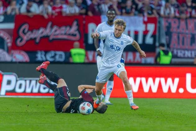 Nürnberg, Deutschland 08. August 2025: 2. Liga - 2025 2026 - 1. FC Nürnberg vs. SV Darmstadt 98 Im Bild: v. li. im Zweikampf Danilo Soares (FCN) und Luca Marseiler (Darmstadt) DFL regulations prohibit any use of photographs as image sequences and or quasi-video