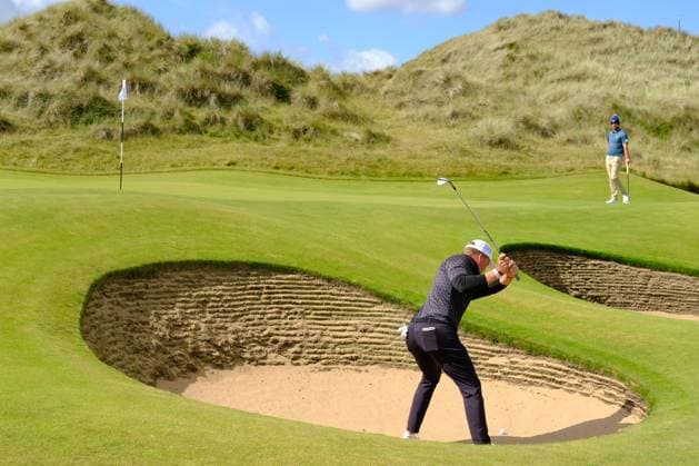 UK: Nexo Championship, Old Course at Trump International Golf Links, Aberdeen, Scotland on 09 August 2025: Pictured: Tadeas Tetak (Slovakia) hits out of a bunker on the 16th green during the third round of the Nexo Championship 2025 at Trump International Golf Links, Aberdeenshire, Scotland Aberdeen Trump International Golf Links Scotland Copyright: xAlexxToddx