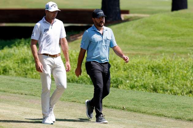 MEMPHIS, TN - AUGUST 09: Sam Burns of the United States and Stephan Jaeger of Germany talk as they walk of the No. 12 tee box during the third round of the FedEx St. Jude Championship, August 9, 2025, at TPC Southward in Memphis, Tennessee. (Photo by Matthew Maxey Icon Sportswire) GOLF: AUG 09 PGA, Golf Herren FedEx Cup Playoffs - FedEx St. Jude Championship EDITORIAL USE ONLY Icon250809008