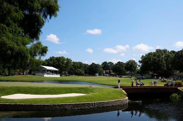 MEMPHIS, TN - AUGUST 09: Shane Lowry of Ireland, Cam Davis of Australia, and Jake Knapp of the United States walk with their caddies across a bridge to the No. 11 green during the third round of the FedEx St. Jude Championship, August 9, 2025, at TPC Southward in Memphis, Tennessee. (Photo by Matthew Maxey Icon Sportswire) GOLF: AUG 09 PGA, Golf Herren FedEx Cup Playoffs - FedEx St. Jude Championship EDITORIAL USE ONLY Icon250809011