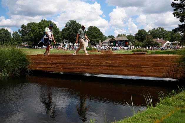 MEMPHIS, TN - AUGUST 09: Tommy Fleetwood of England walks across the bridge behind No. 11 during the third round of the FedEx St. Jude Championship, August 9, 2025, at TPC Southward in Memphis, Tennessee. (Photo by Matthew Maxey Icon Sportswire) GOLF: AUG 09 PGA, Golf Herren FedEx Cup Playoffs - FedEx St. Jude Championship EDITORIAL USE ONLY Icon250809059