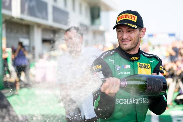 Marco Wittmann (Deutschland, Schubert Motorsport, BMW M4 GT3 Evo, 11) jubelt auf dem Podium nach der Siegerehrung mit Sekt Schaumwein ueber Platz 2, GER, ADAC DTM Nuerburgring, Rennen 2, Saison 2025, 10.08.2025 GER, ADAC DTM Nuerburgring, Rennen 2, Saison 2025, 10.08.2025 Nuerburg *** Marco Wittmann Germany, Schubert Motorsport, BMW M4 GT3 Evo, 11 cheers on the podium after the podium ceremony with sparkling wine about 2nd place, GER, ADAC DTM Nuerburgring, Race 2, Season 2025, 10 08 2025 GER, ADAC DTM Nuerburgring, Race 2, Season 2025, 10 08 2025 Nuerburg Copyright: xEibner-Pressefoto Memmlerx EP_MMR