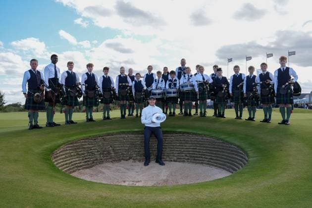 Grant Forrest (SCO) in a bunker at the 18th green with the Robert Gordon College Pipe Band after winning the NEXO Championship. Nexo Championship, Day Four, Golf, Trump International Golf Links, Aberdeenshire, Scotland, UK - 10 Aug 2025Aberdeenshire Trump International Golf Links Scotland United Kingdom EDITORIAL USE ONLY No use with unauthorised audio, video, data, fixture lists, club league logos or live services. Online in-match use limited to 120 images, no video emulation. No use in betting, games or single club league player publications. Copyright: xStuartxWallace Shutterstockx 15429702ai