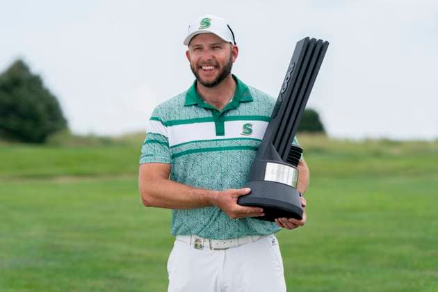 BOLINGBROOK, IL - AUGUST 10: LIV Golf Chicago individual champion Dean Burmester poses with the individual championship trophy after the final round of LIV Golf Chicago on Sunday, August 10, 2025 at Bolingbrook Golf Club in Bolingbrook, IL (Photo by Ben Hsu Icon Sportswire) GOLF: AUG 10 LIV Golf Chicago EDITORIAL USE ONLY Icon224250810001